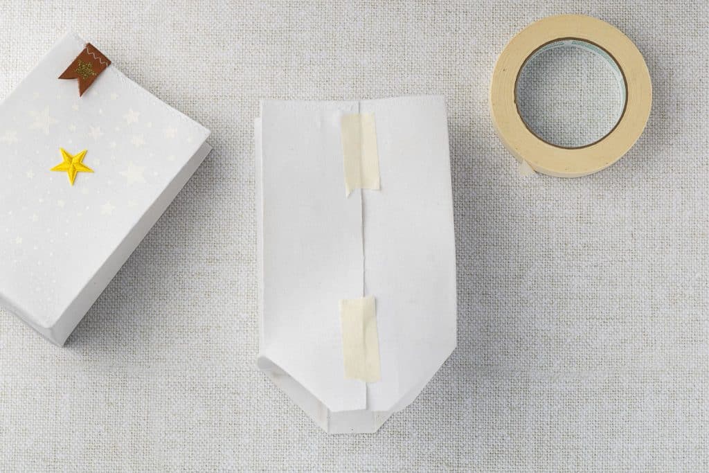 Use tape to hold bag together while it dries.