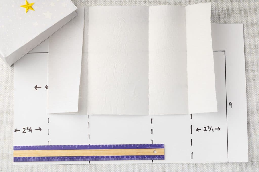 Continue to fold and crease.