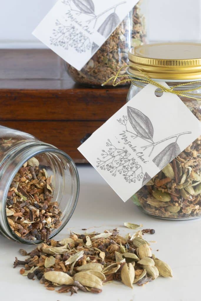 Jars of masala chai with gift tags.