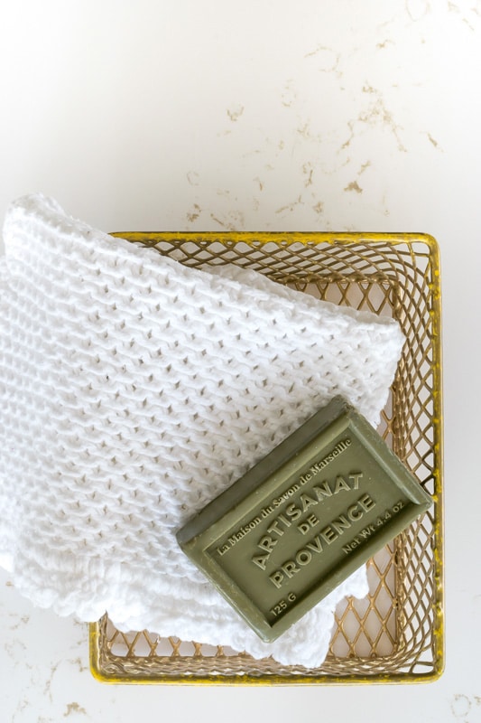 chinese wave washcloth in gold mesh box.