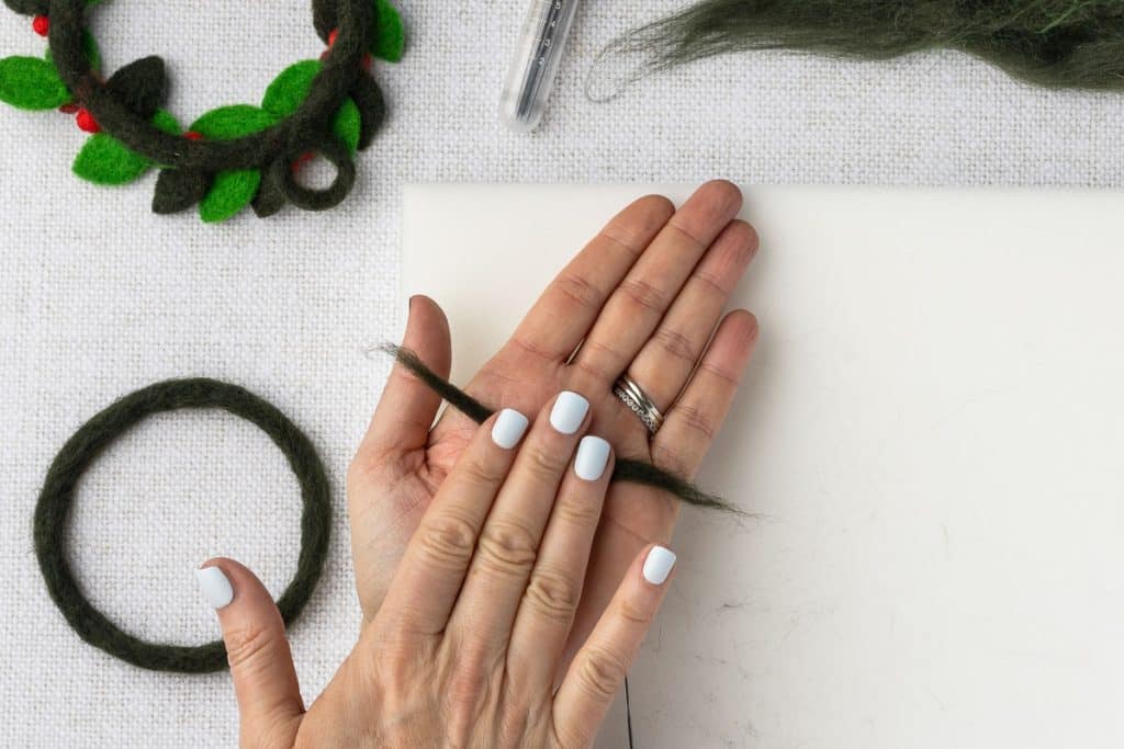 Rolling the roving for hanging loop.