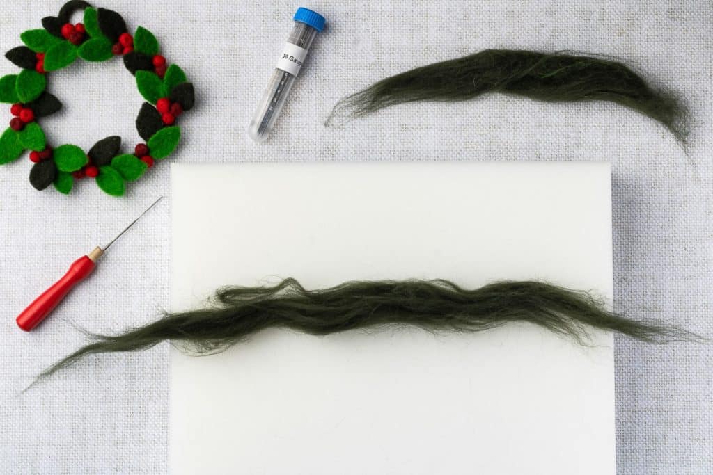 Green roving stretched.