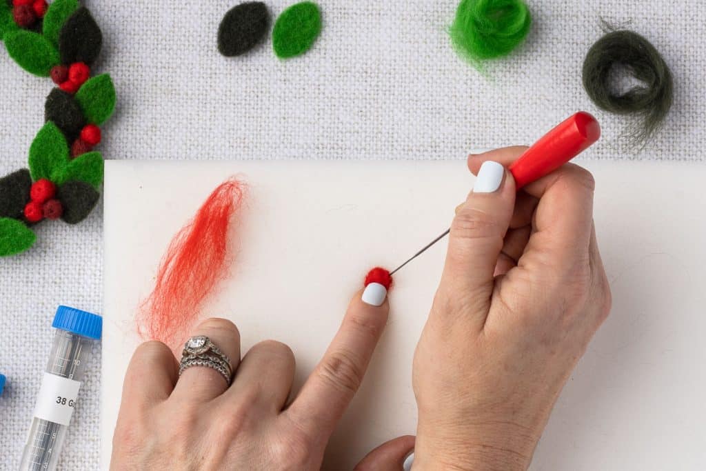 Red roving to make berry.