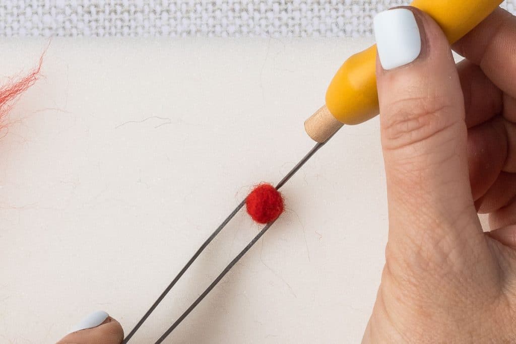 Red roving to make berry.