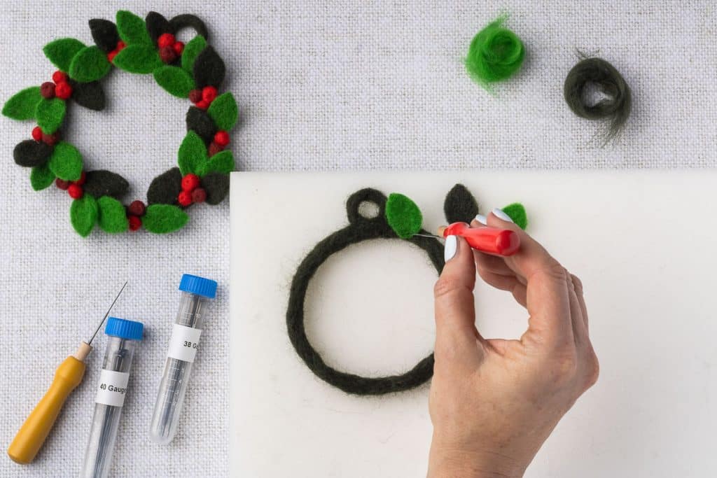 Attach leaf to wreath base.