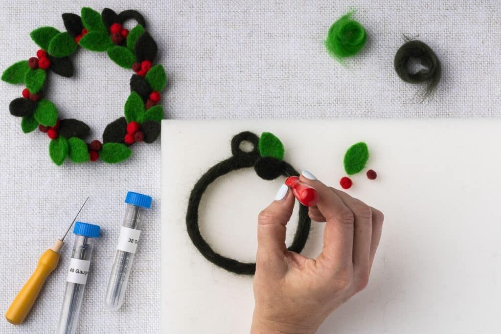 Attach leaf to wreath base.