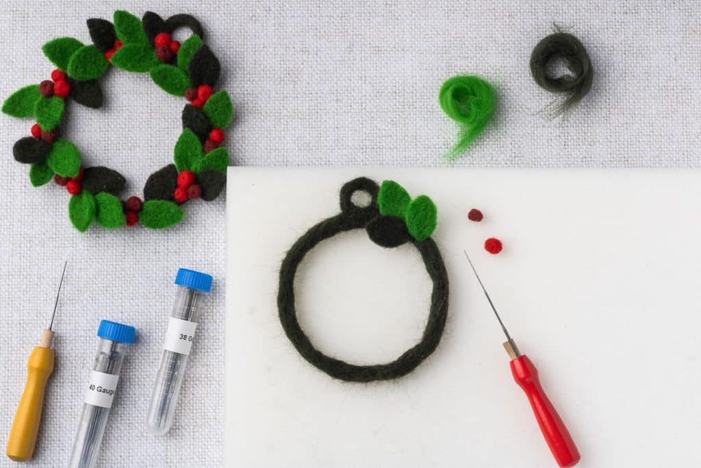 Attach leaf to wreath base.