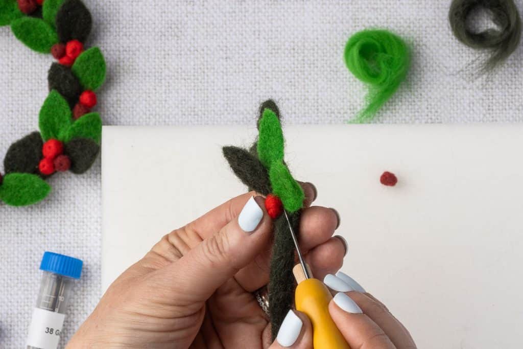 Attach leaf to wreath base.