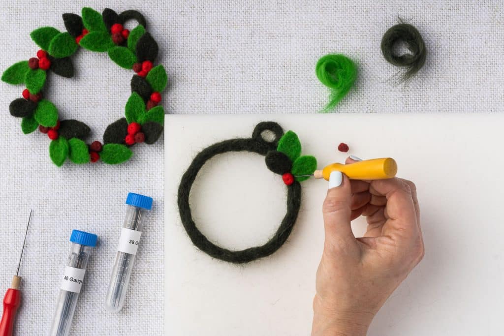 Attach leaf to wreath base.