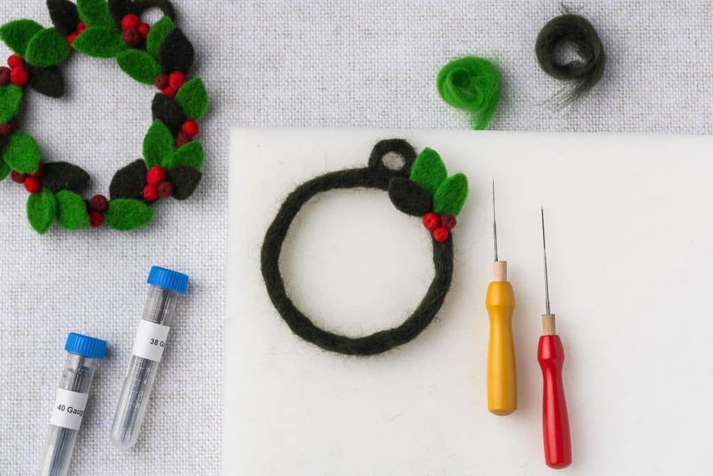 Attach leaf to wreath base.