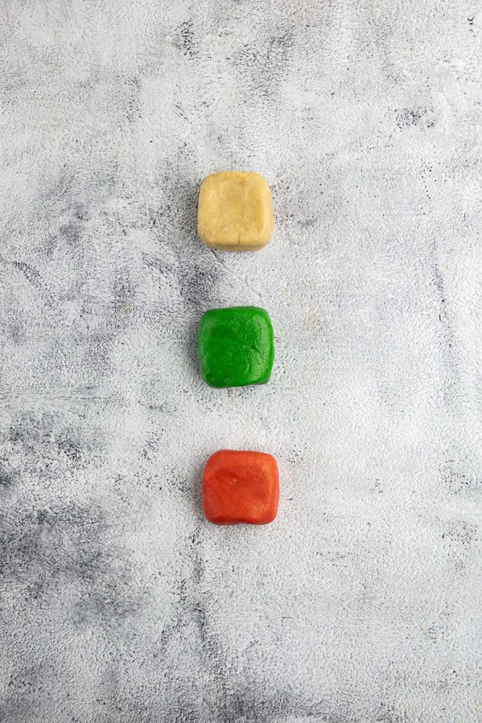 Three different color cookie dough.