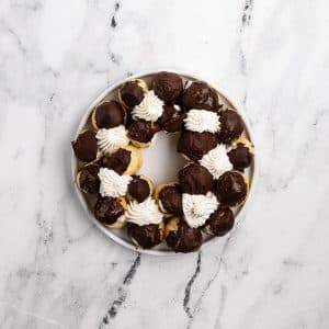 Large and small circle of profiteroles.