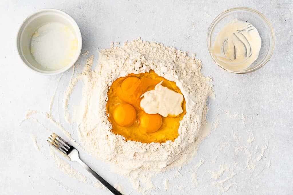 Flour well with eggs,