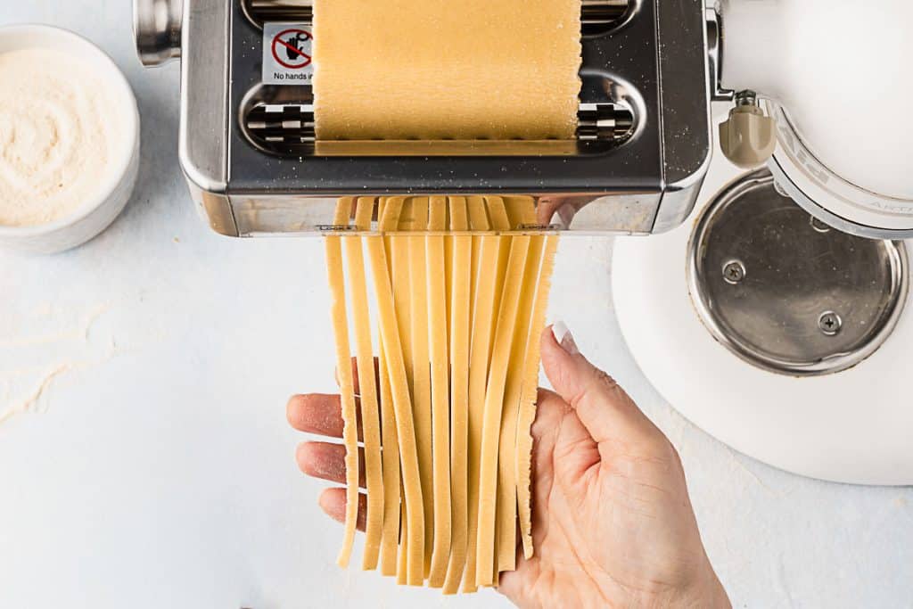 Cut fettuccine noodles.