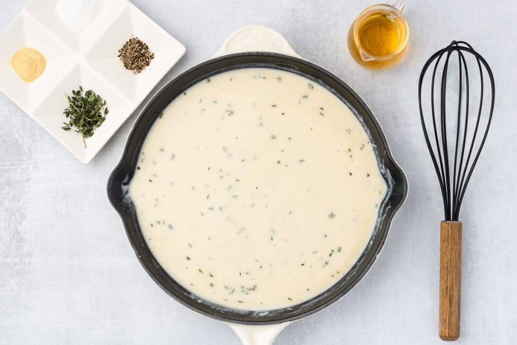 spices mixed in sauce.