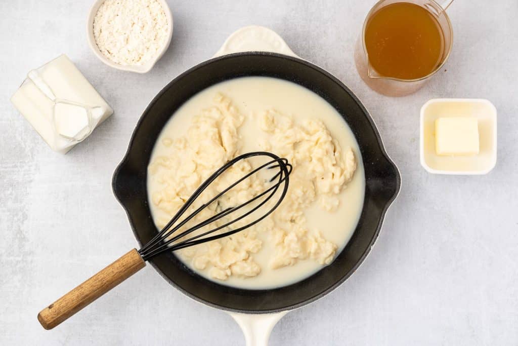 whisk broth and milk.