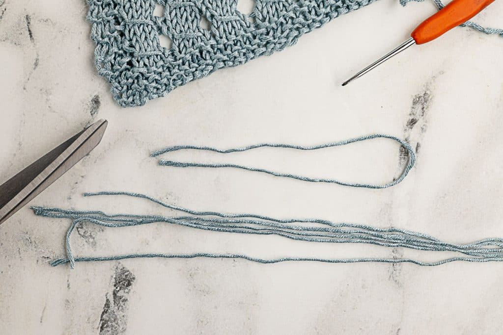 Fold each length in half.