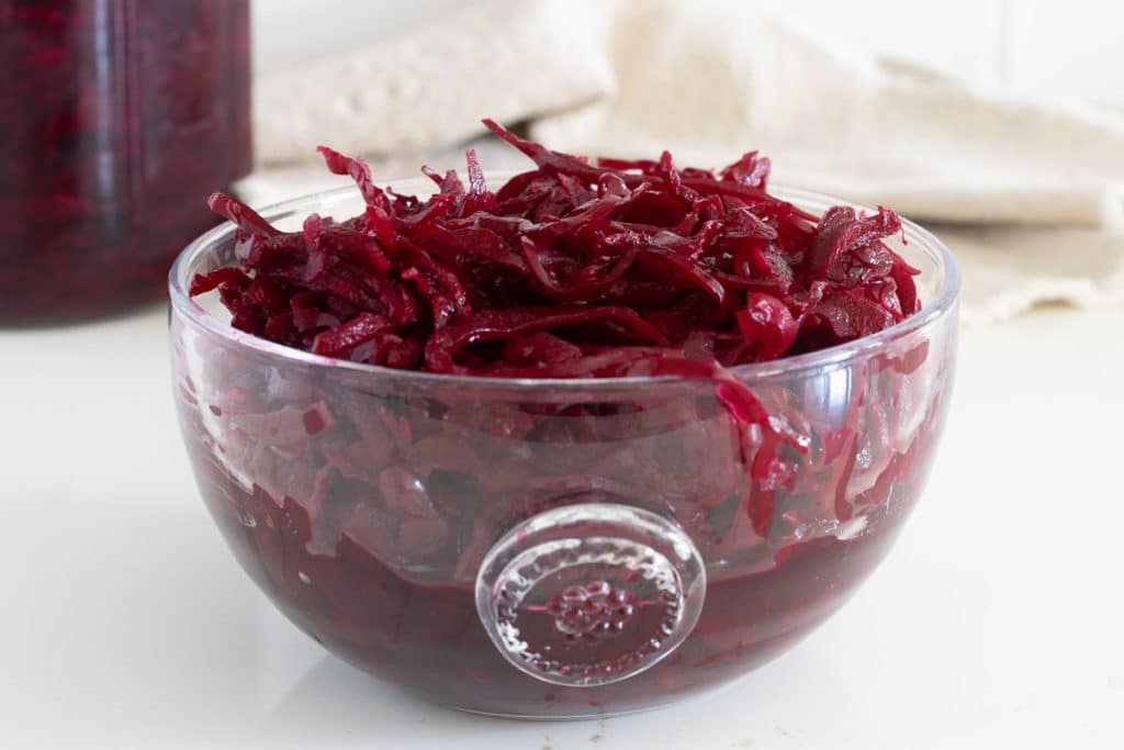 Beet Sauerkraut in a glass bowl.