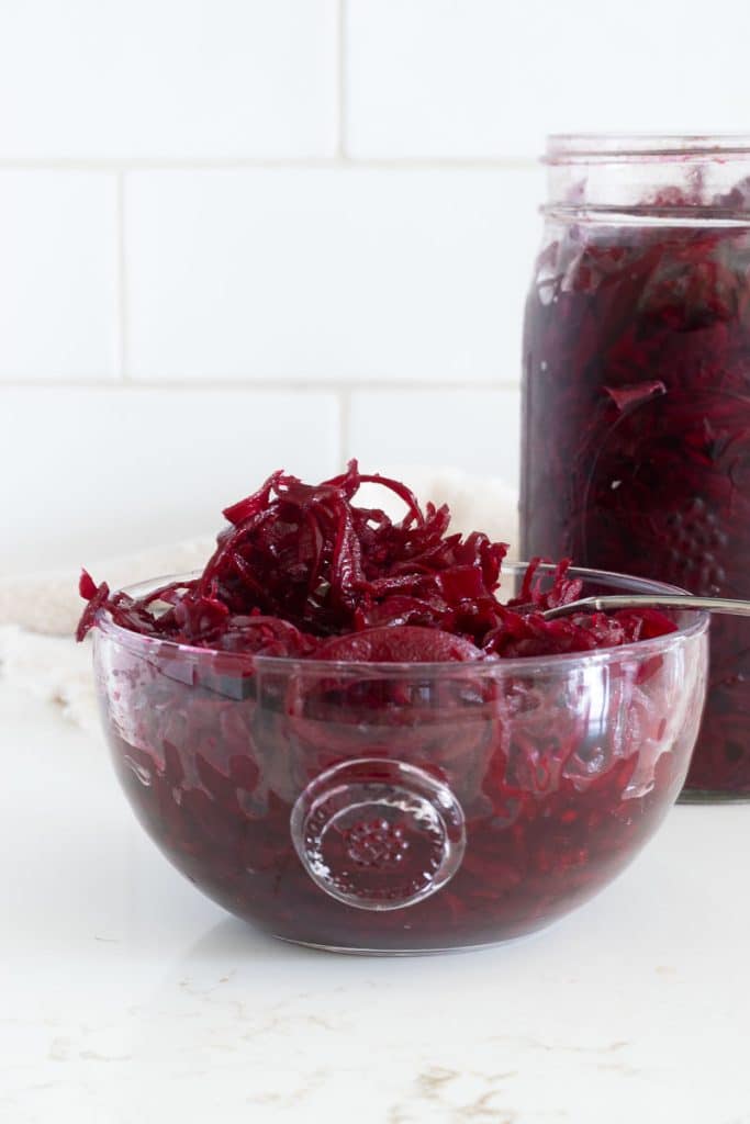 Beet Sauerkraut in a glass bowl.