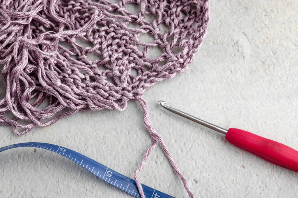 Adding lace to shawl.