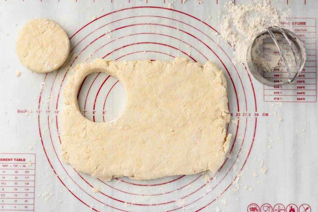 Cutting biscuits.