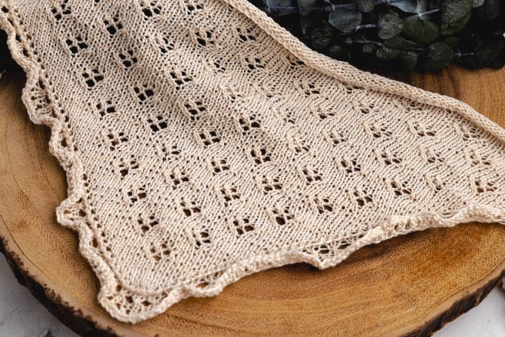 Finished knit lace bandana.