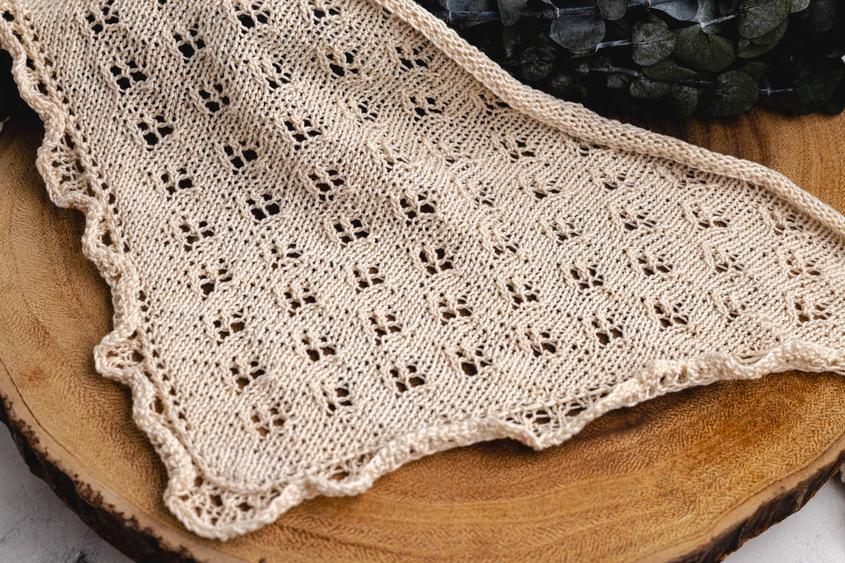 Finished knit lace bandana.