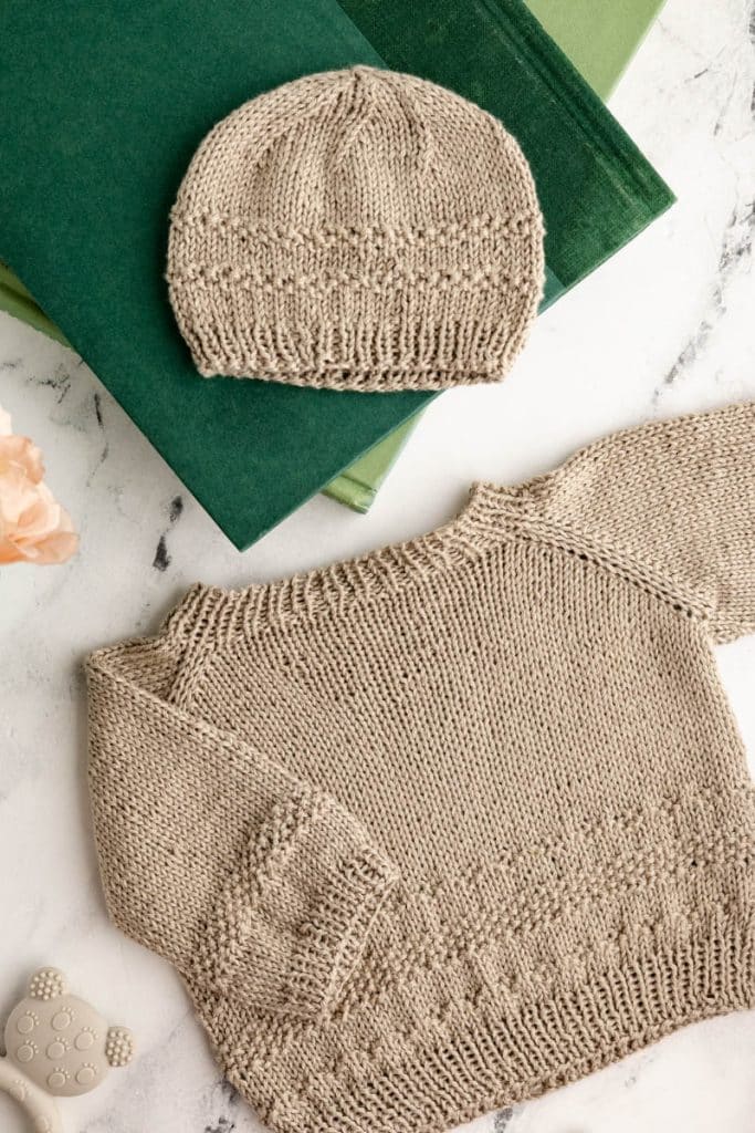 Baby Sweater and Hat knit in taupe yarn.
