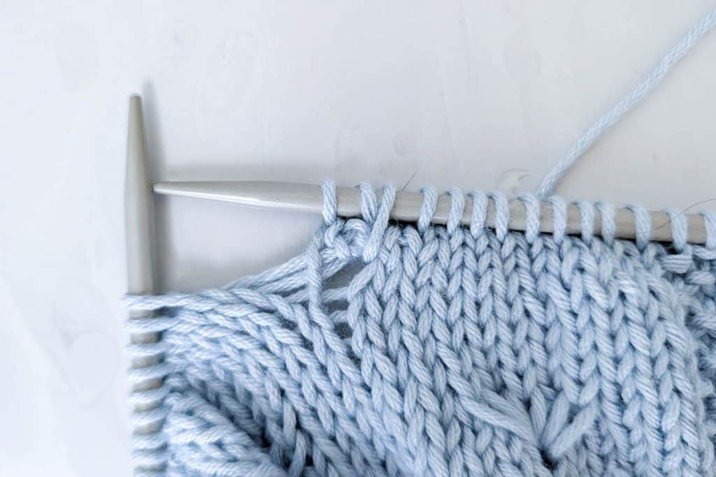 Knit two stitches.