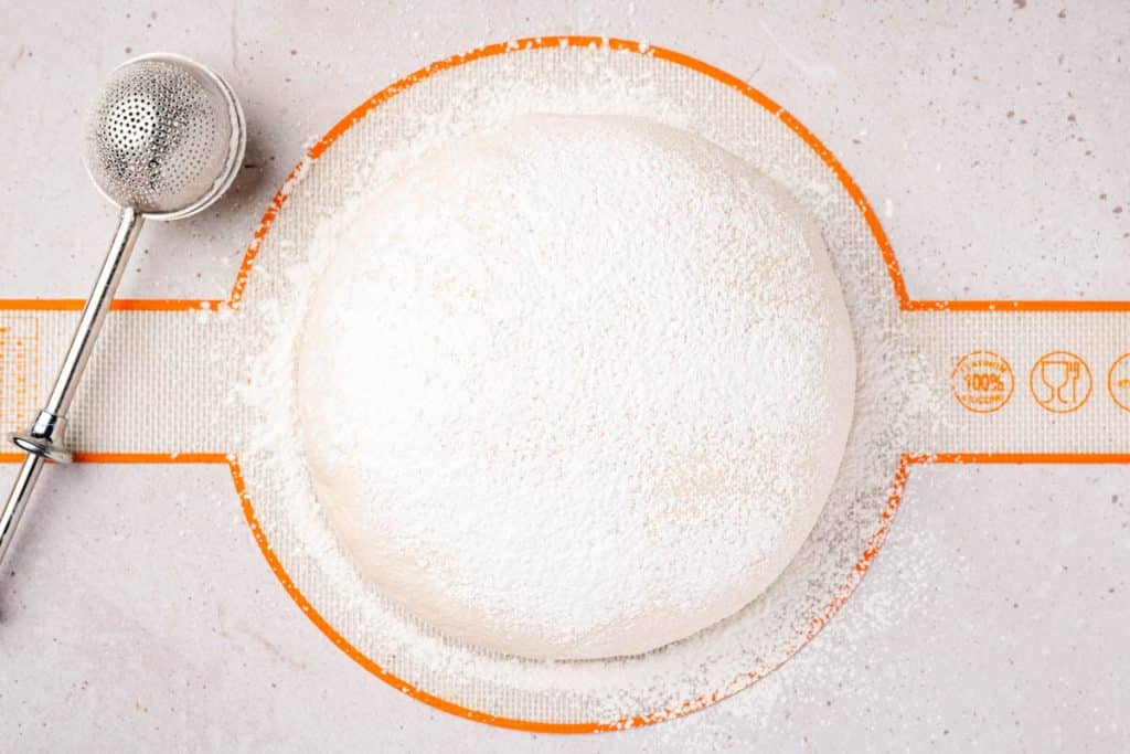Floured boule for scallop and vines cut.