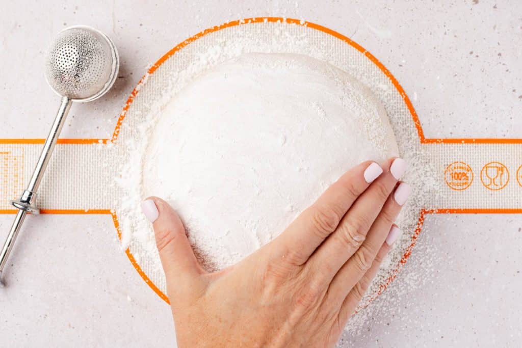 Floured boule for scallop and vines cut.