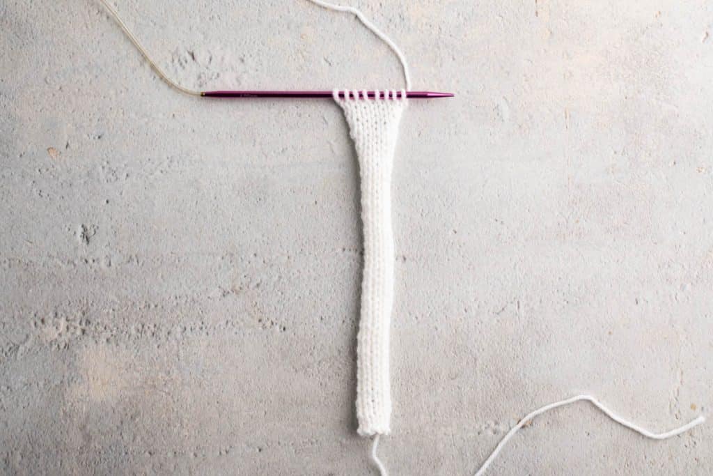 Knitting arms and legs.