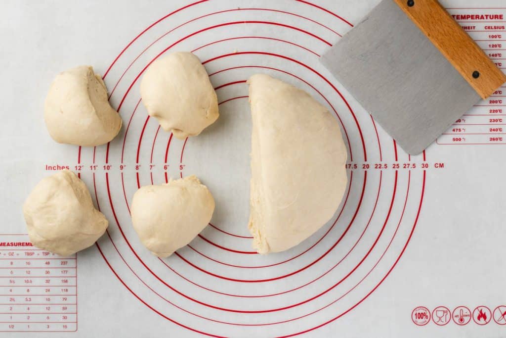 Cutting dough.